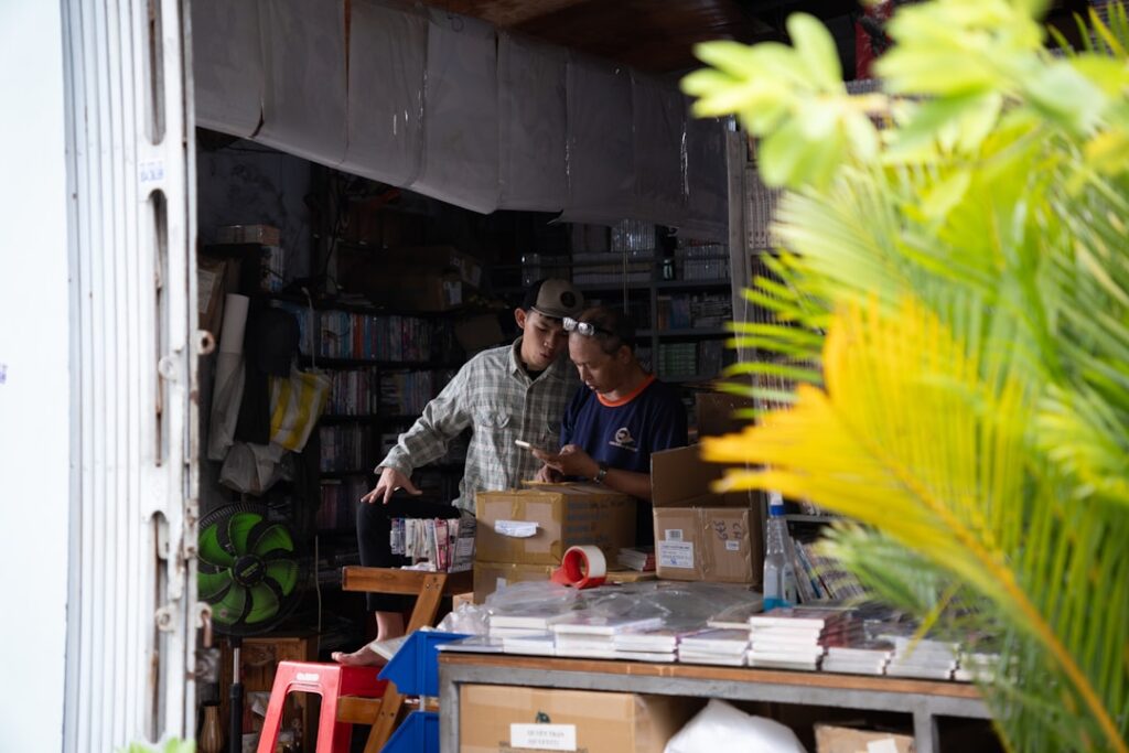 Two people working together in a small business store