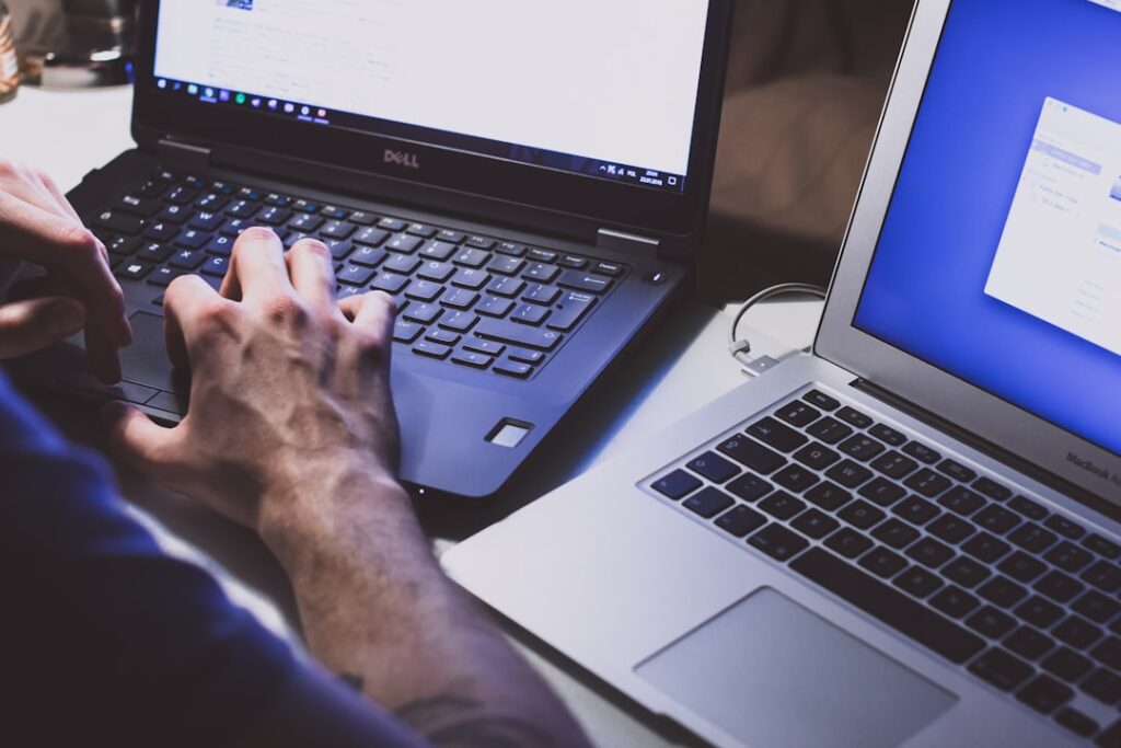 Person using a laptop computer in an office setting